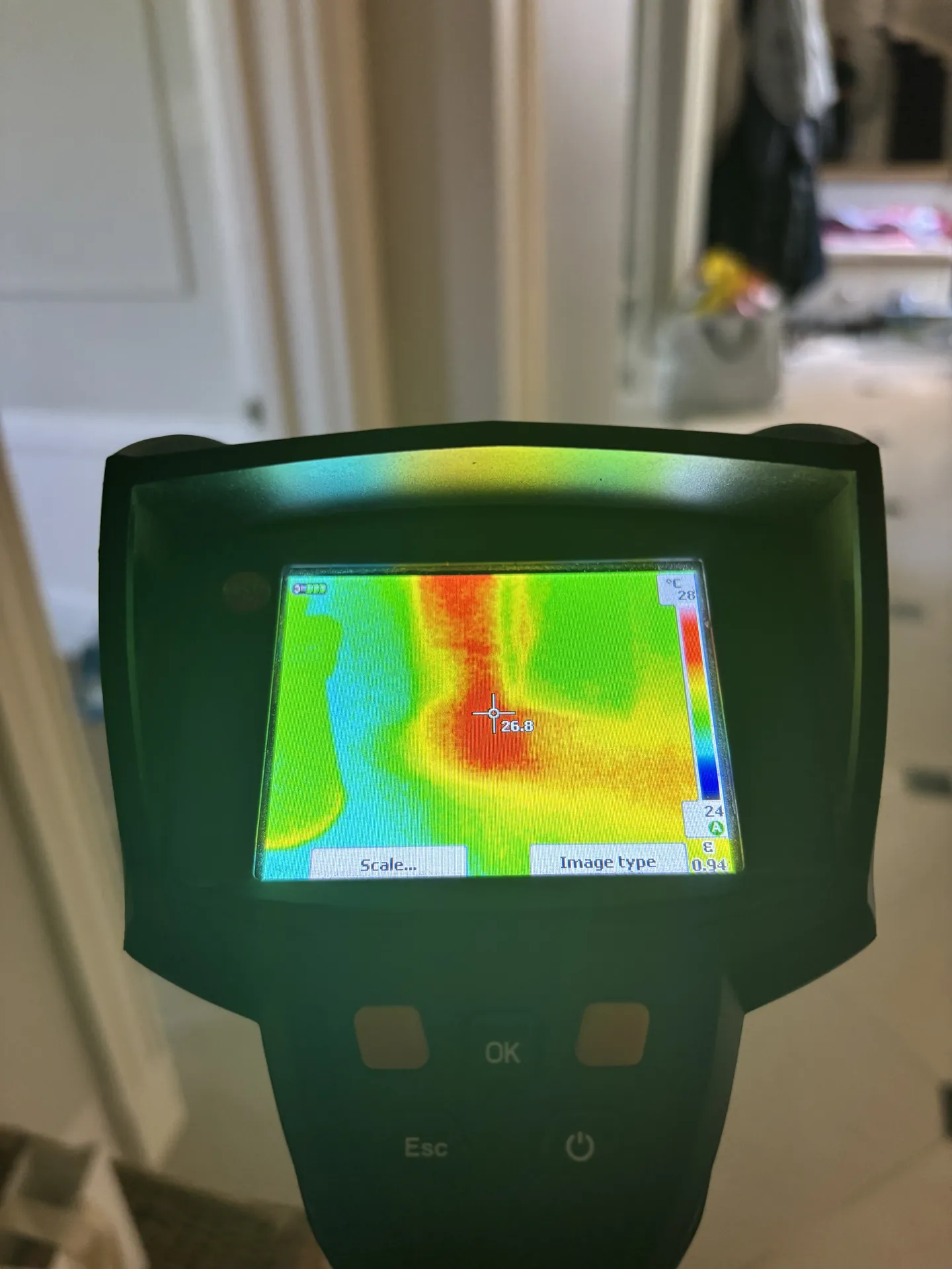 Thermal imaging camera showing the temperature pattern of a hallway floor
