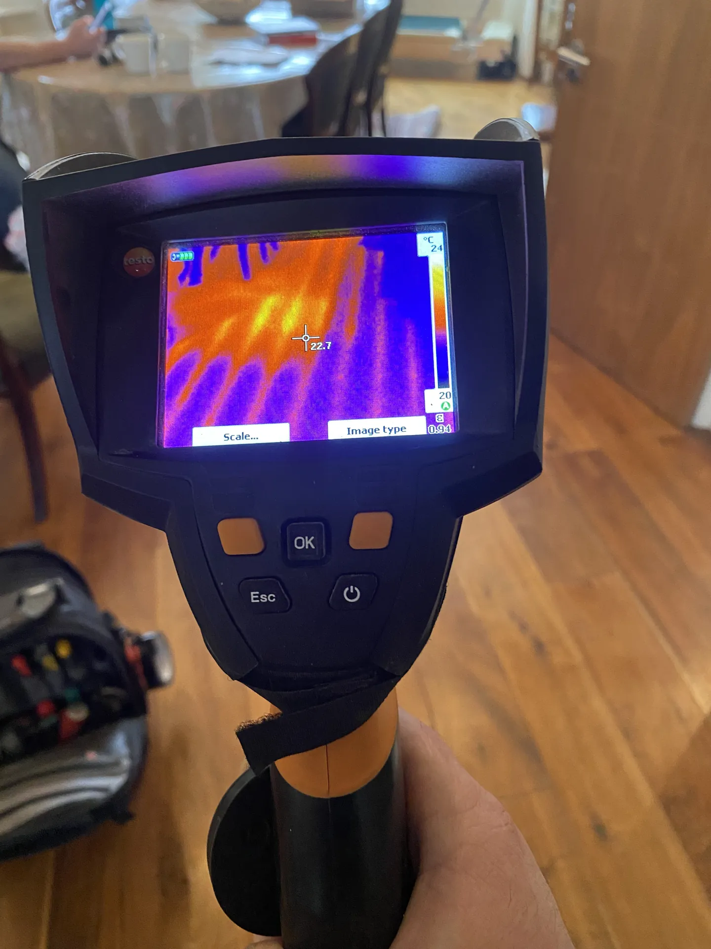Thermal image showing underfloor heating loops running under a wooden floor
