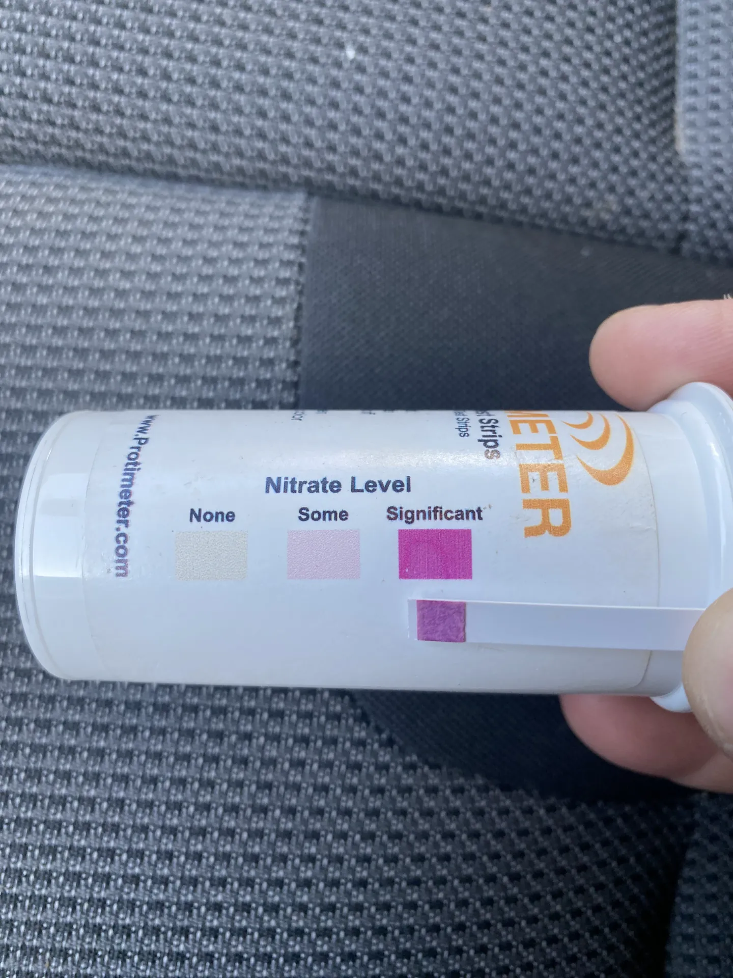 Test strip used to identify whether escaping water is mains, heating or waste